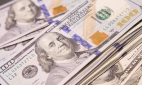 Курс доллара на Мосбирже достиг 56 рублей на фоне рисков со стороны Греции